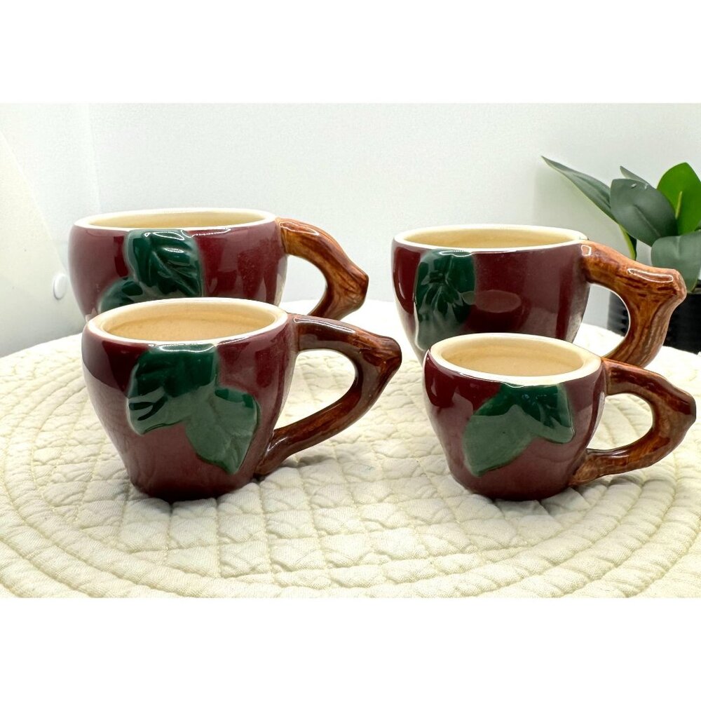 Set Of 4 Ceramic Measuring Cups With Leaf & Branch Handles 1 Cup-1/8 Cup Stacked